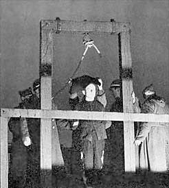 Hinrichtung Josef Hartgen, who killed four of the B-24 crewmen, awaits his execution. National Archives 